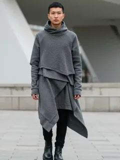 Stylish person in avant-garde fashion walking in an urban setting
