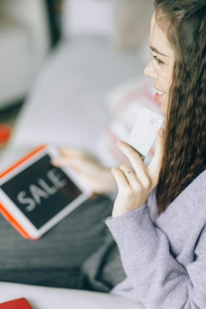 A person holding a smartphone with a push notification from an e-commerce app displayed on the screen. The notification highlights a limited-time offer and includes a call-to-action button.