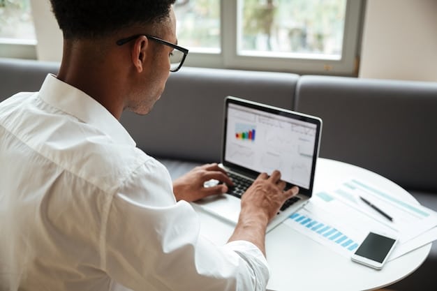An image of a person using a laptop to analyze data and metrics from an influencer marketing campaign. The data includes graphs showing website traffic, engagement rates, and conversion rates, indicating the ROI of the campaign. The person is focused on interpreting the data and making strategic decisions.