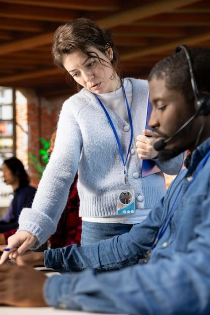 A facilitator leading a role-playing exercise during a customer service training session. Team members are actively participating and practicing empathetic communication skills.