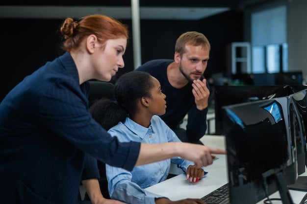 A group of diverse employees participating in a cybersecurity training session, with a focus on identifying phishing emails and secure password practices. The image should convey engagement, learning, and a proactive approach to enhancing cybersecurity awareness within the organization.