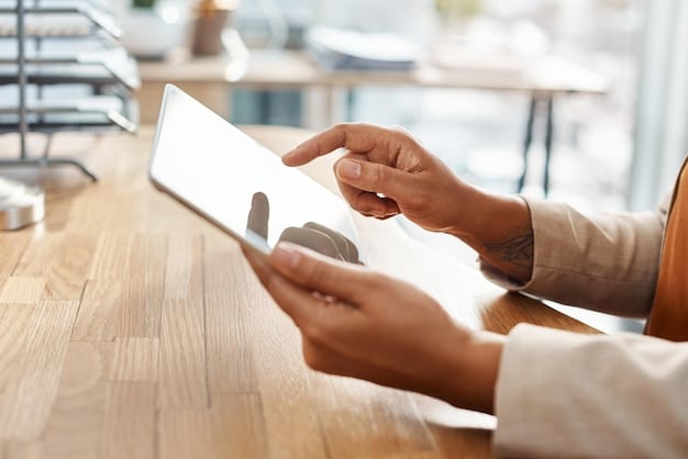 A customer using their fingerprint to authorize a payment on a tablet during an online shopping experience, emphasizing convenience and security. The Future of Biometric Payments: Preparing Your US E-commerce Business for 2025 and Beyond illustrated by the seamless transaction process.