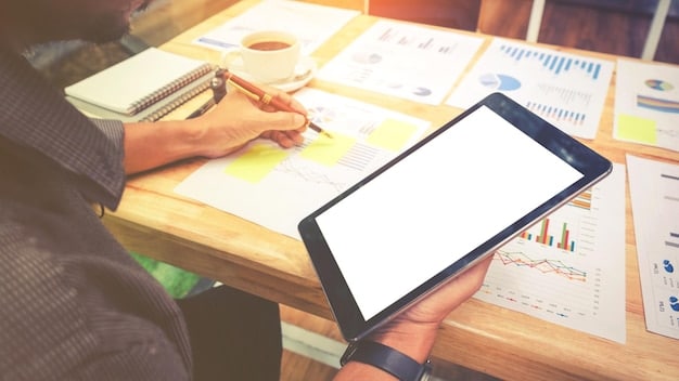 A person's hand drawing on a tablet with financial charts and e-commerce product listings in the background, illustrating strategic planning.