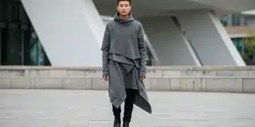 Stylish person in avant-garde fashion walking in an urban setting